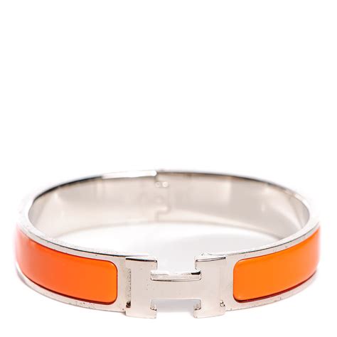 hermes bracelet orange silver.